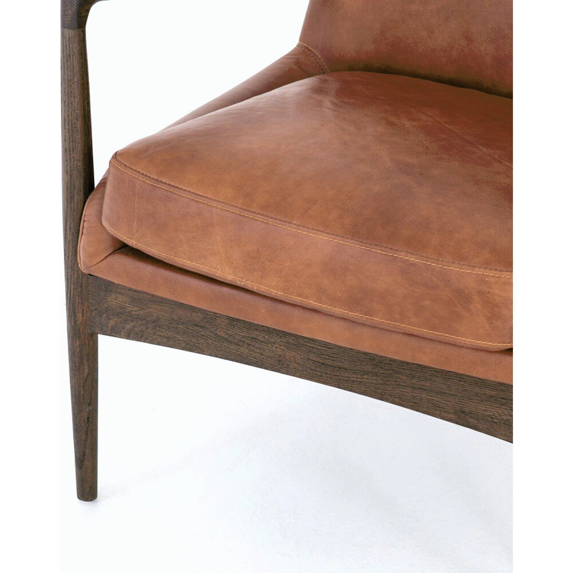 Braden Chair by Four Hands. Made from top grain leather, solid oak, 100% polyester in a modern style.