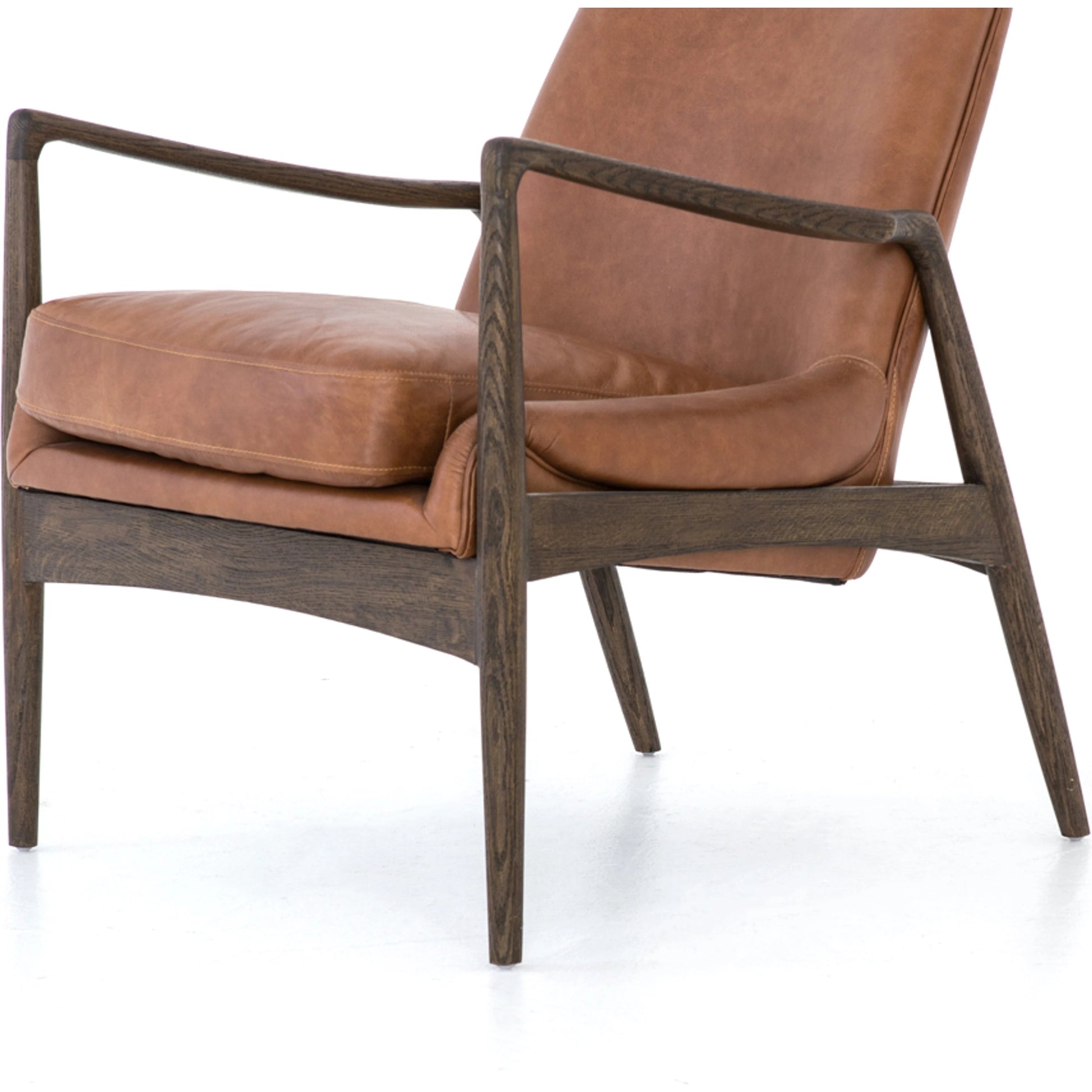 Braden Chair by Four Hands. Made from top grain leather, solid oak, 100% polyester in a modern style.