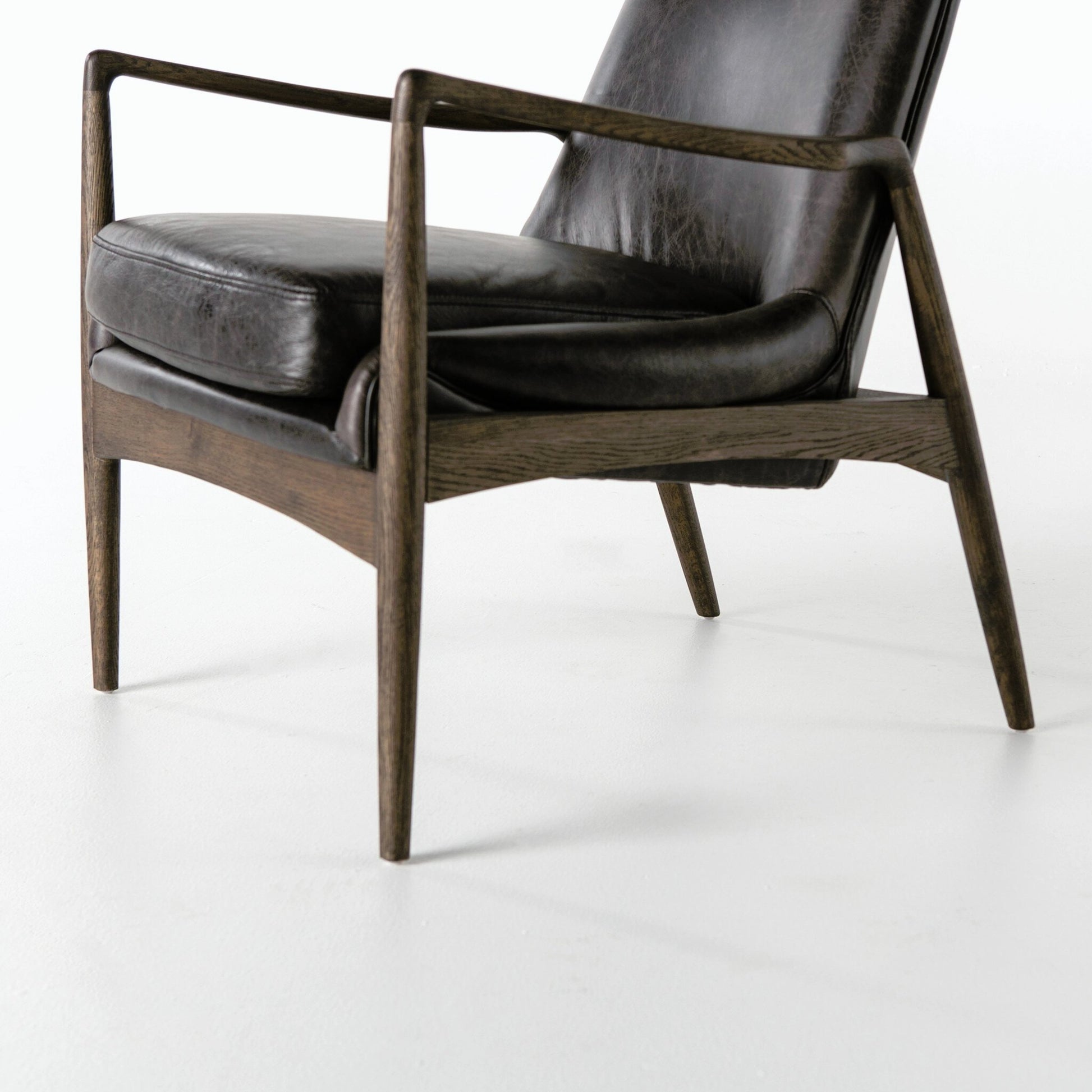 Braden Chair by Four Hands. Made from top grain leather, solid oak, 100% polyester in a modern style.