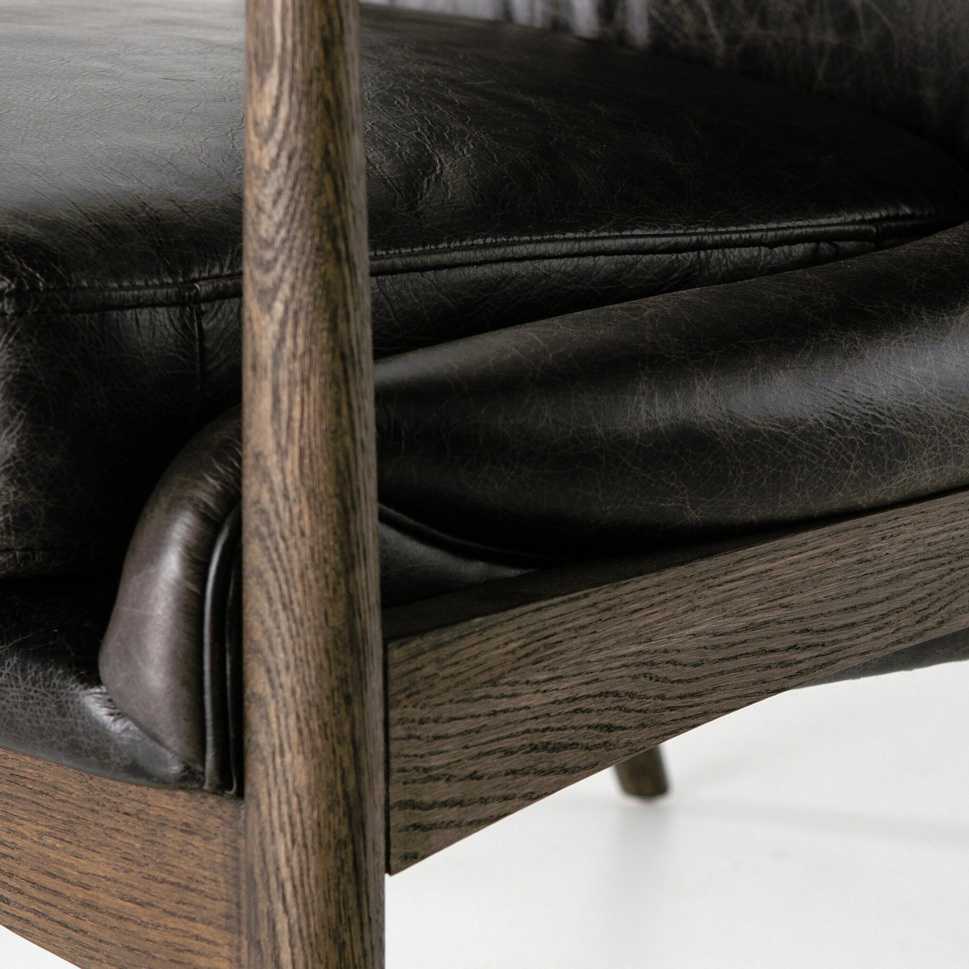 Braden Chair by Four Hands. Made from top grain leather, solid oak, 100% polyester in a modern style.