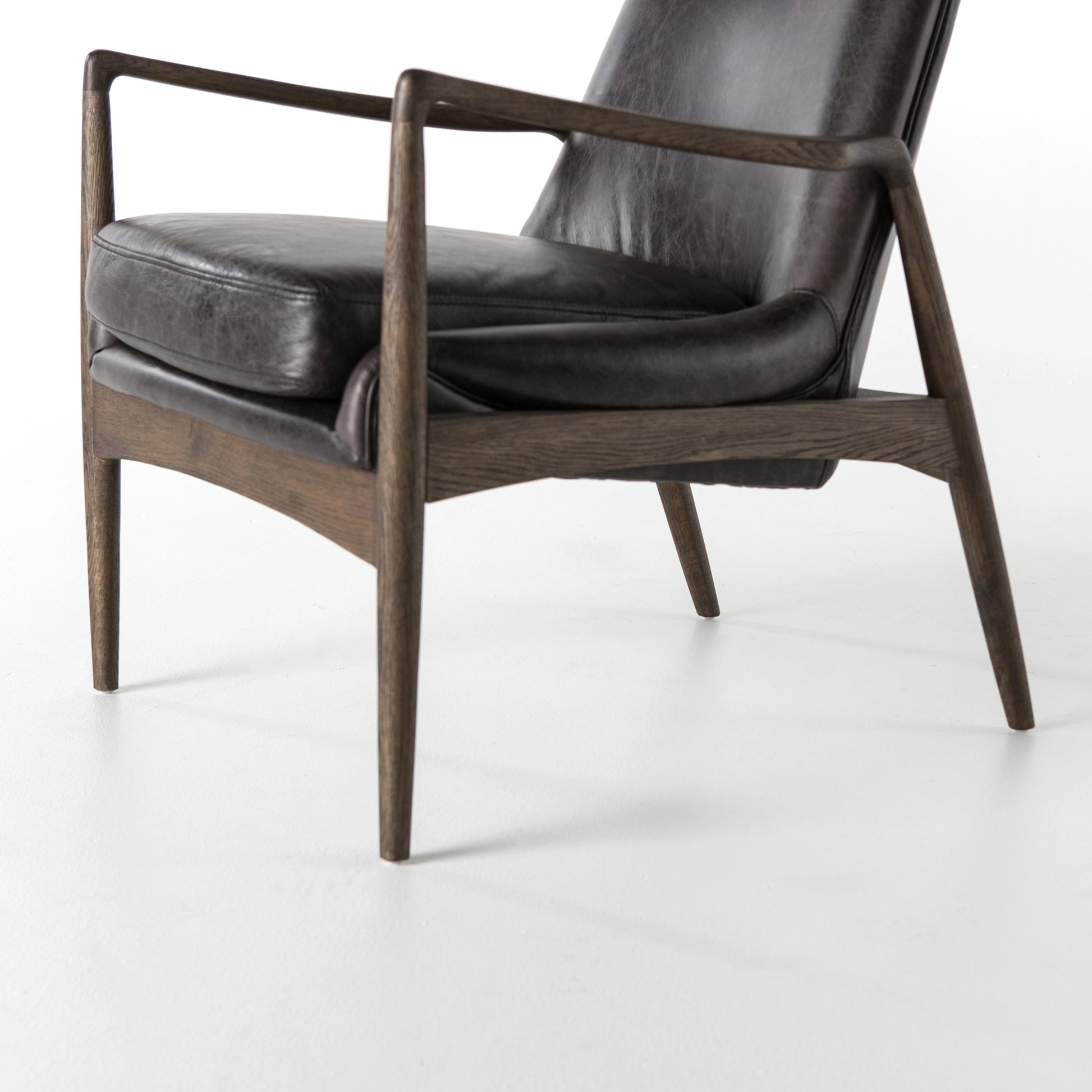 Braden Chair by Four Hands. Made from top grain leather, solid oak, 100% polyester in a modern style.