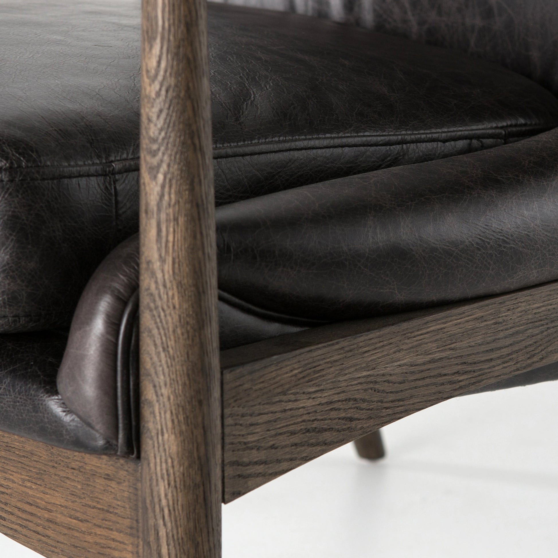 Braden Chair by Four Hands. Made from top grain leather, solid oak, 100% polyester in a modern style.