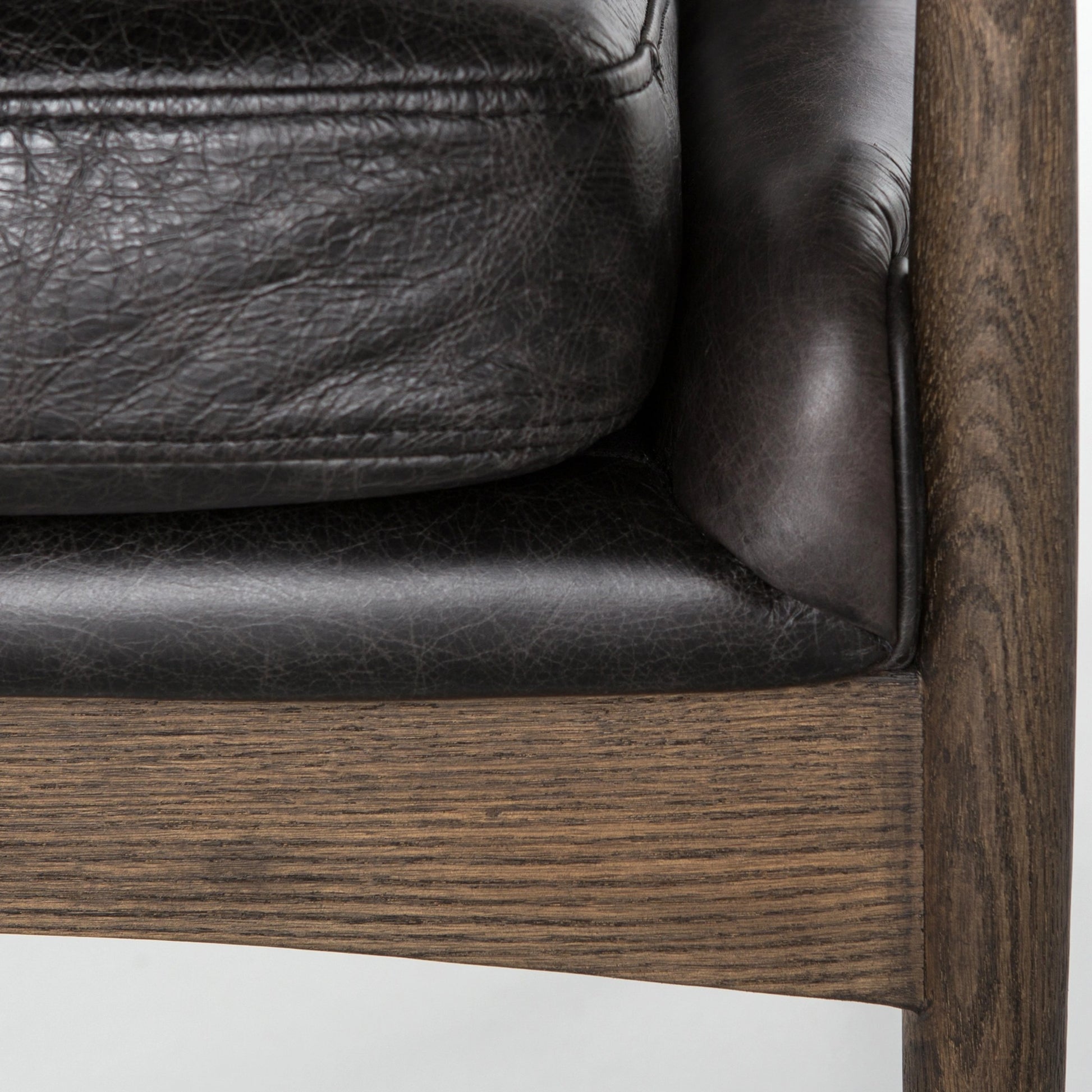 Braden Chair by Four Hands. Made from top grain leather, solid oak, 100% polyester in a modern style.