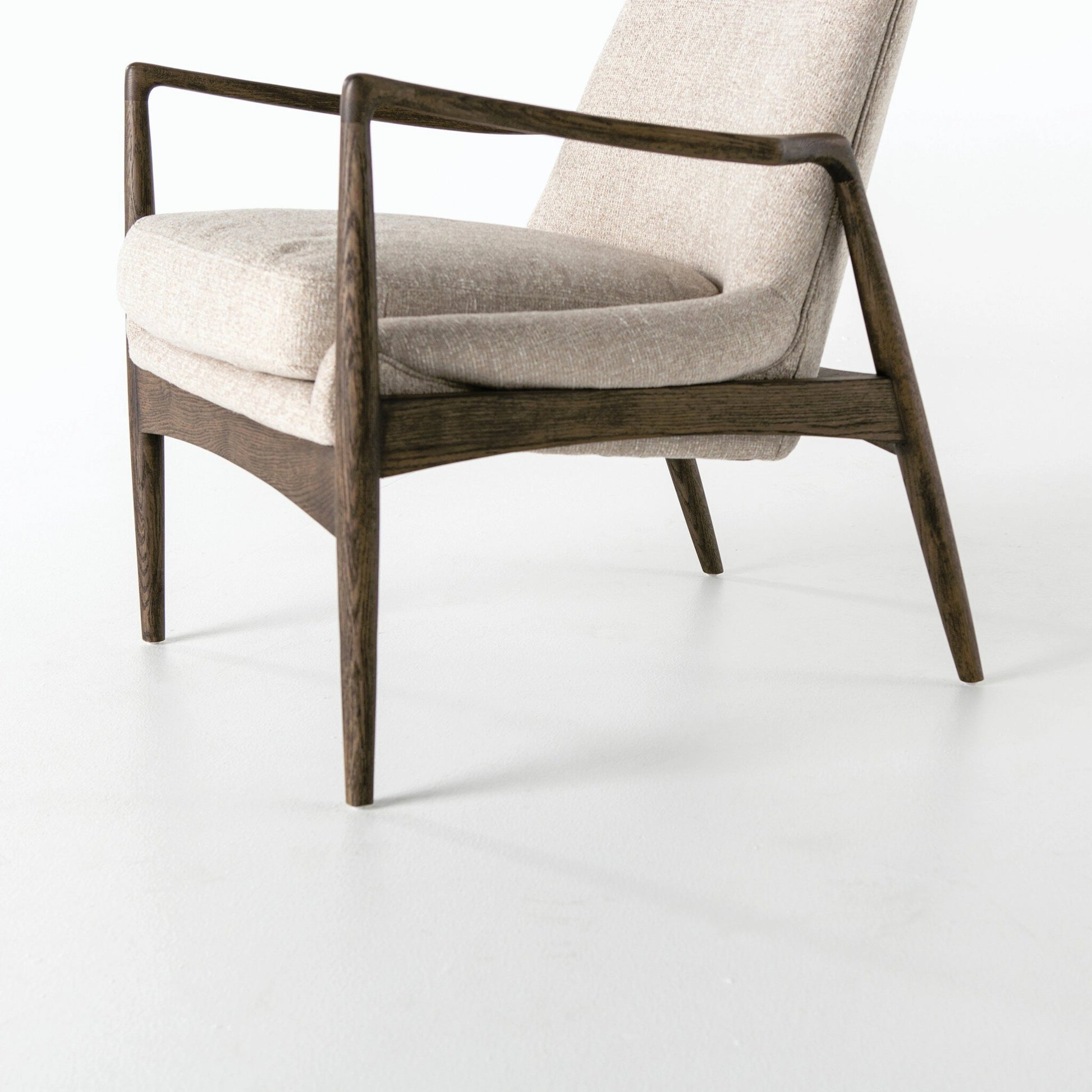 Braden Chair by Four Hands. Made from top grain leather, solid oak, 100% polyester in a modern style.