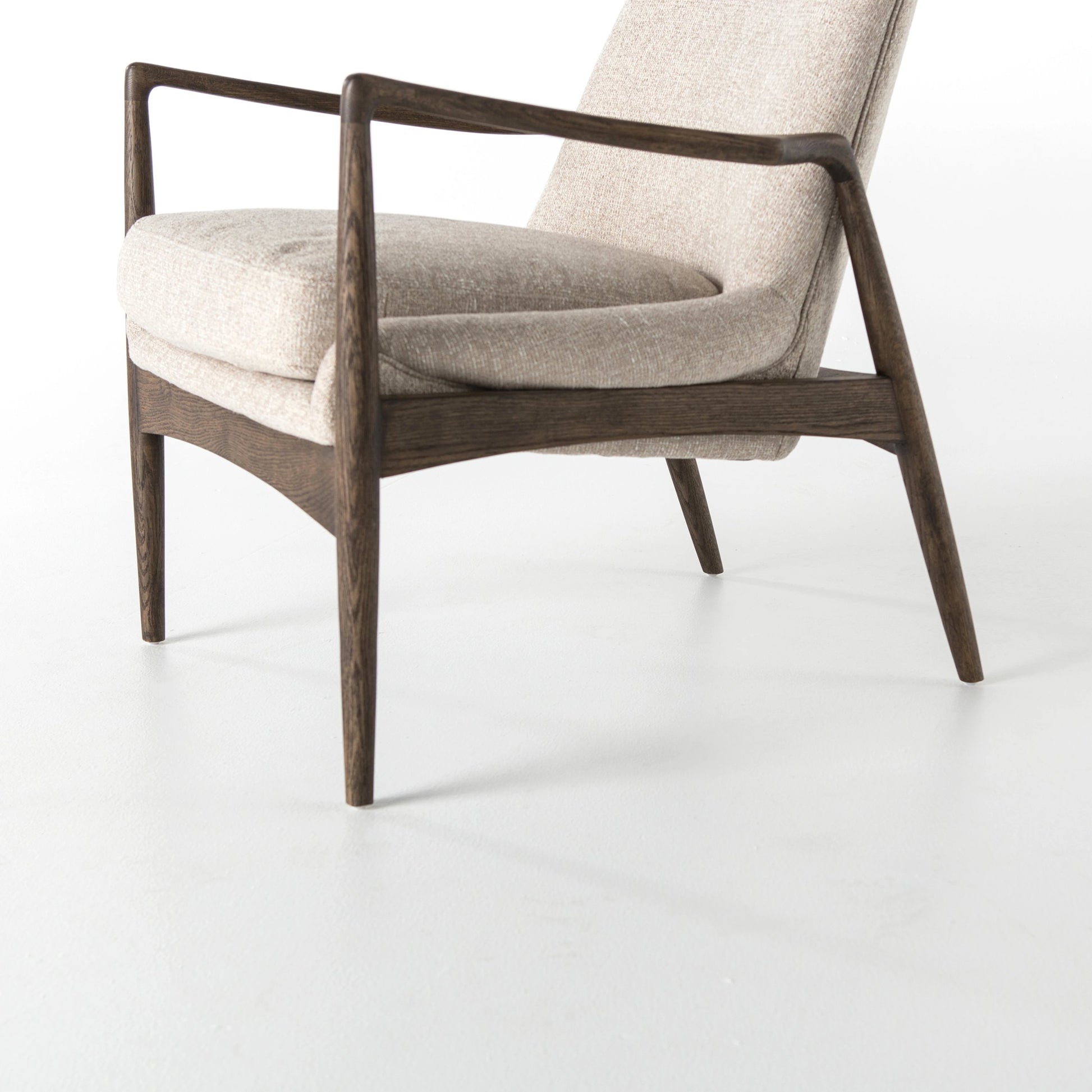 Braden Chair by Four Hands. Made from top grain leather, solid oak, 100% polyester in a modern style.