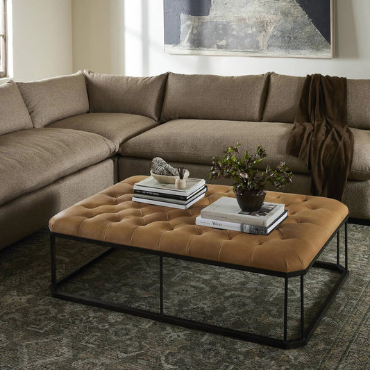 Isle Leather Ottoman by Four Hands in palermo butterscotch and aged bronze. Made from top grain leather, iron, 90% polyurethane foam, 10% fiber in a modern style.