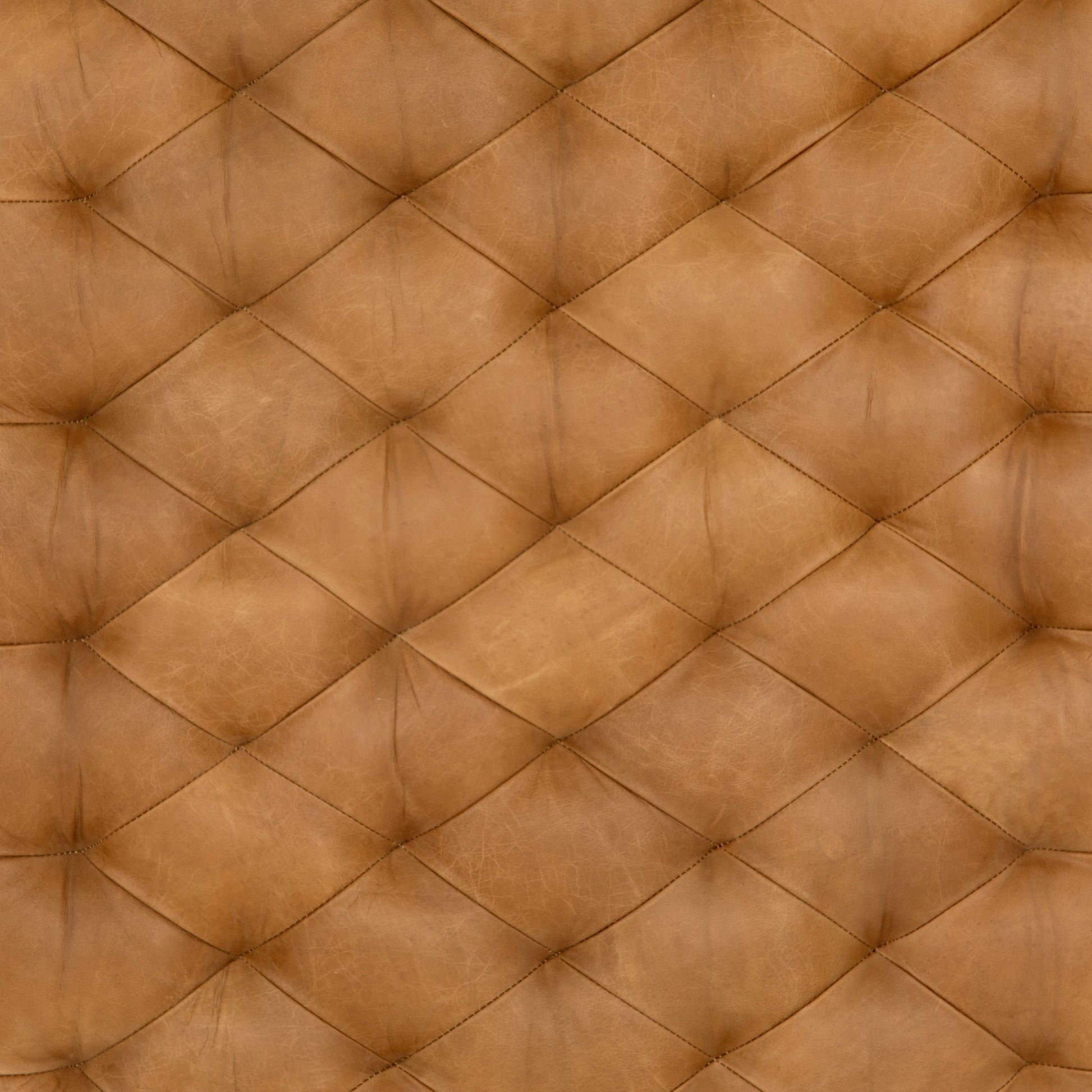 Isle Leather Ottoman by Four Hands in palermo butterscotch and aged bronze. Made from top grain leather, iron, 90% polyurethane foam, 10% fiber in a modern style.