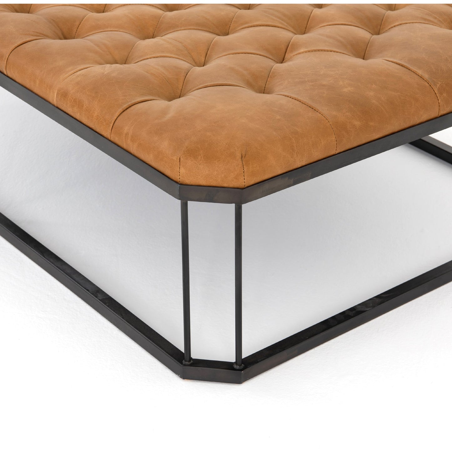 007 S-279368 | Additional Silo | Isle Leather Ottoman by Four Hands in palermo butterscotch and aged bronze. Made from top grain leather, iron, 90% polyurethane foam, 10% fiber in a modern style.