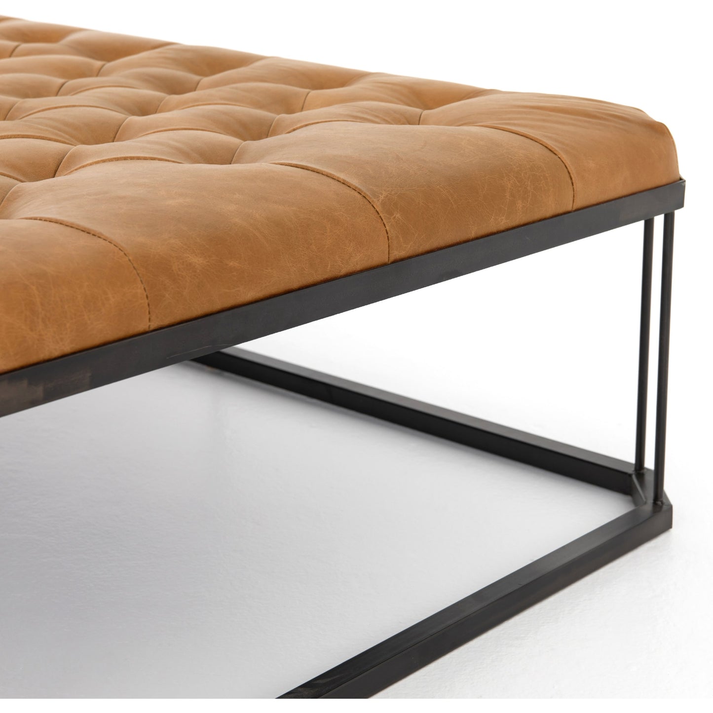 008 S-279368 | Additional Silo | Isle Leather Ottoman by Four Hands in palermo butterscotch and aged bronze. Made from top grain leather, iron, 90% polyurethane foam, 10% fiber in a modern style.