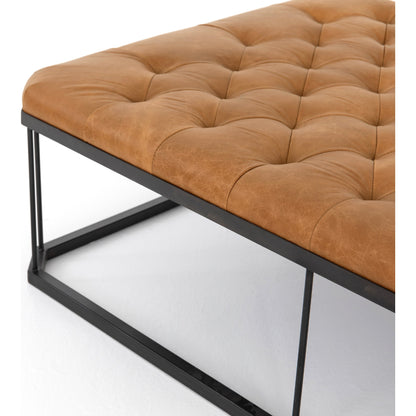 Isle Leather Ottoman by Four Hands in palermo butterscotch and aged bronze. Made from top grain leather, iron, 90% polyurethane foam, 10% fiber in a modern style.