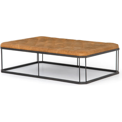 Isle Leather Ottoman by Four Hands in palermo butterscotch and aged bronze. Made from top grain leather, iron, 90% polyurethane foam, 10% fiber in a modern style.