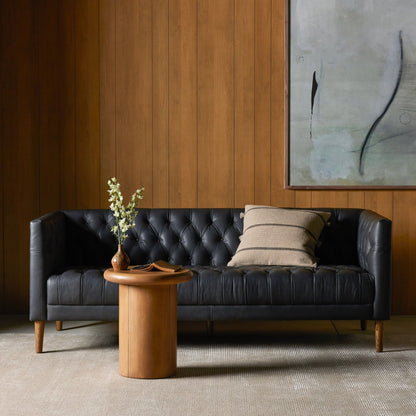 Williams Leather Sofa by Four Hands. Made from top grain leather, solid ash, 100% polyester in a rustic style.