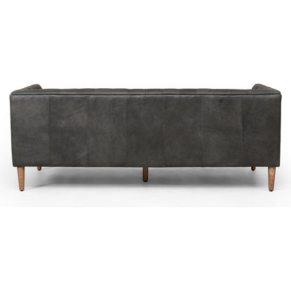 Williams Leather Sofa by Four Hands. Made from top grain leather, solid ash, 100% polyester in a rustic style.