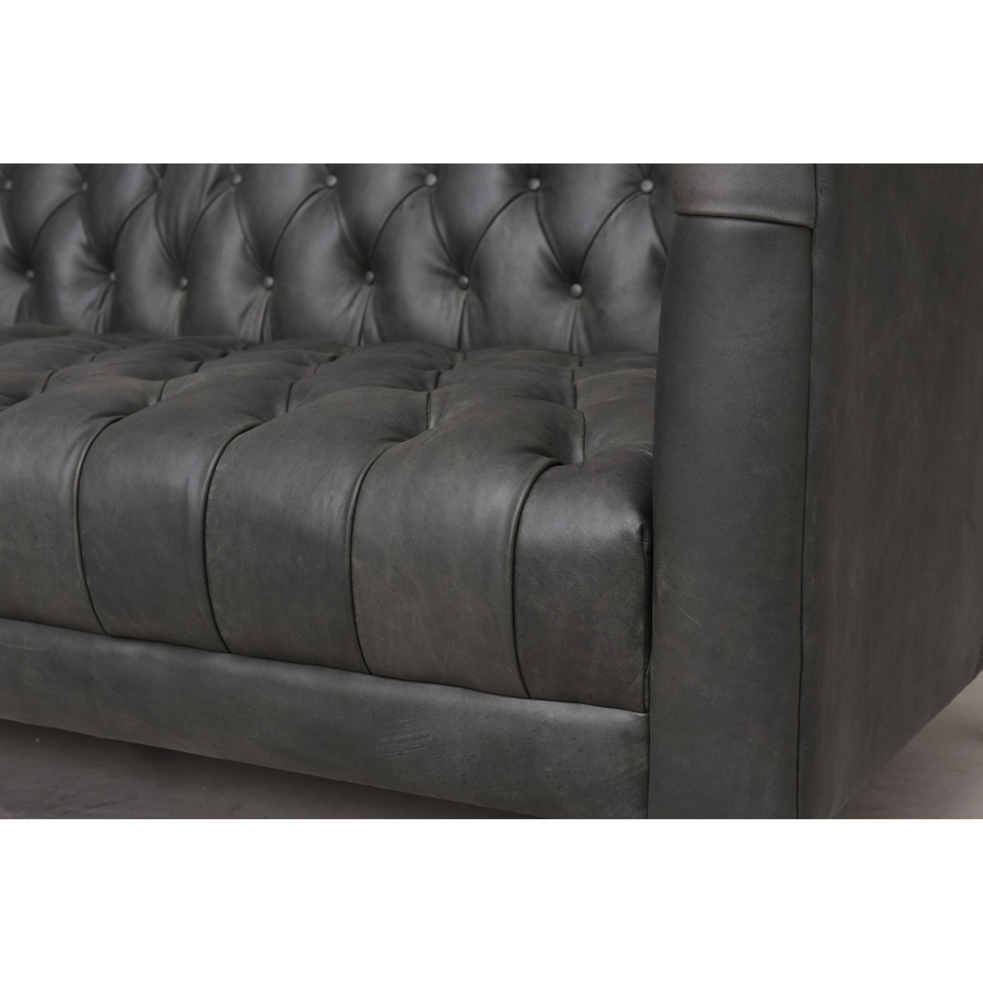 Williams Leather Sofa by Four Hands. Made from top grain leather, solid ash, 100% polyester in a rustic style.