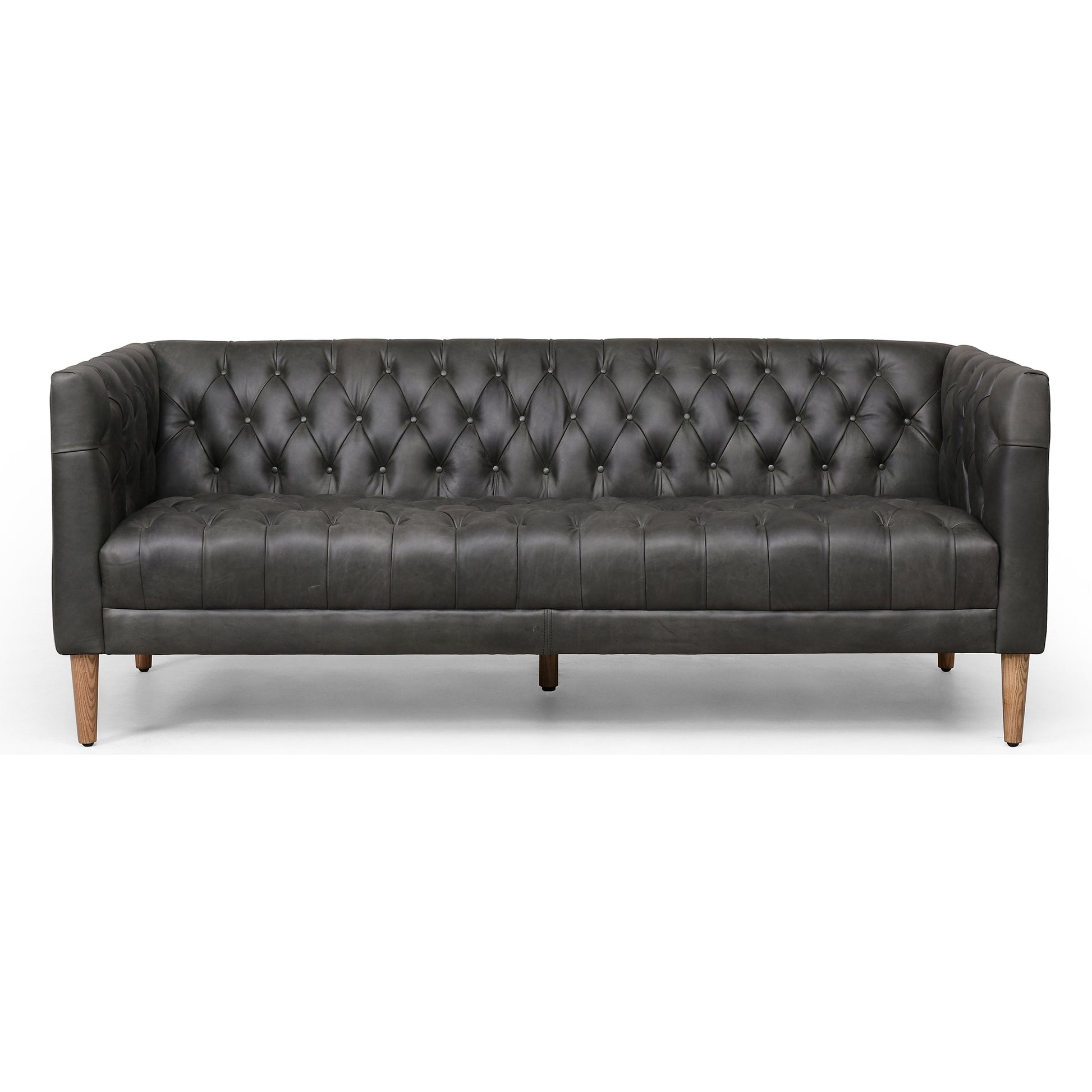 Williams Leather Sofa by Four Hands. Made from top grain leather, solid ash, 100% polyester in a rustic style.