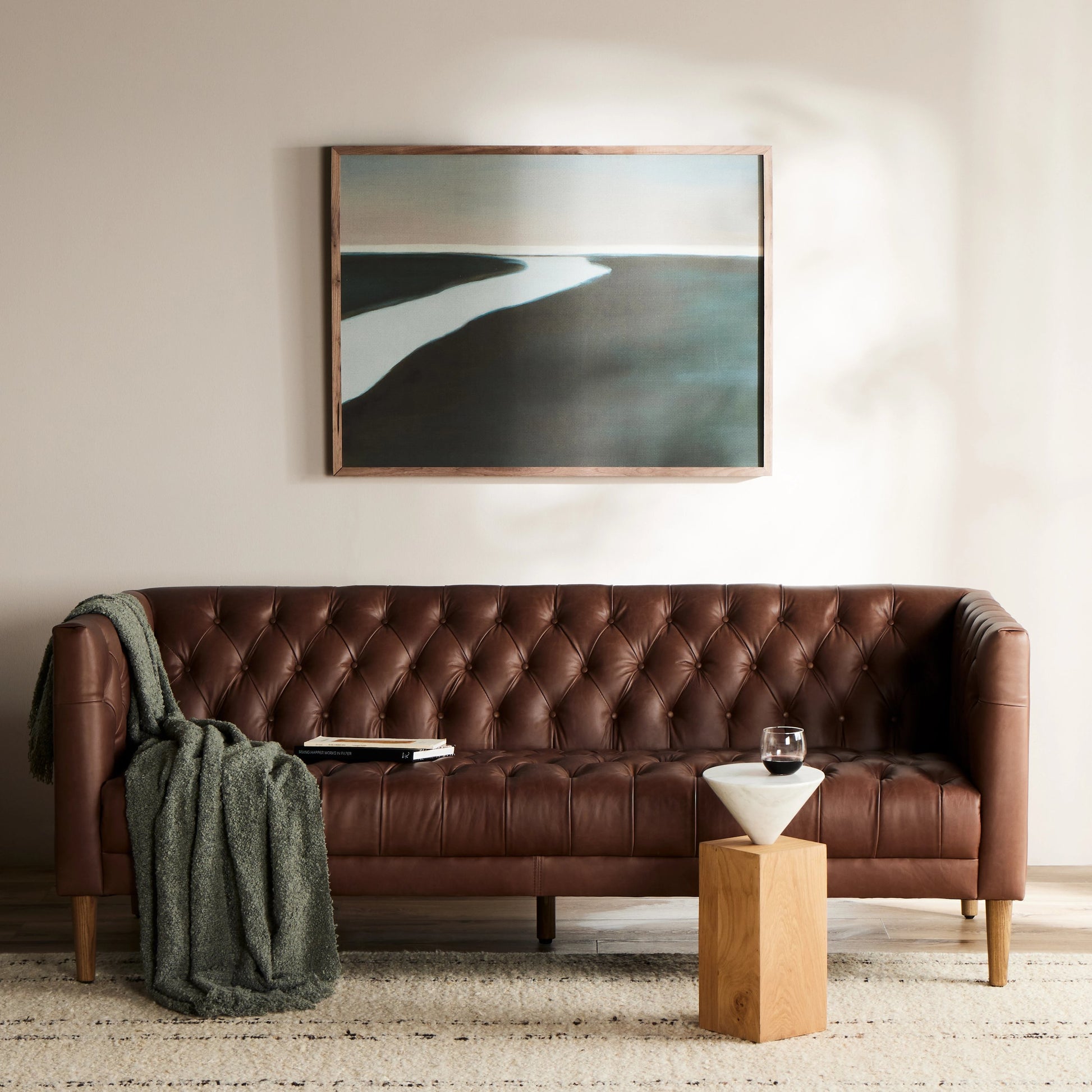 Williams Leather Sofa by Four Hands. Made from top grain leather, solid ash, 100% polyester in a rustic style.