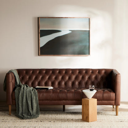 Williams Leather Sofa by Four Hands. Made from top grain leather, solid ash, 100% polyester in a rustic style.
