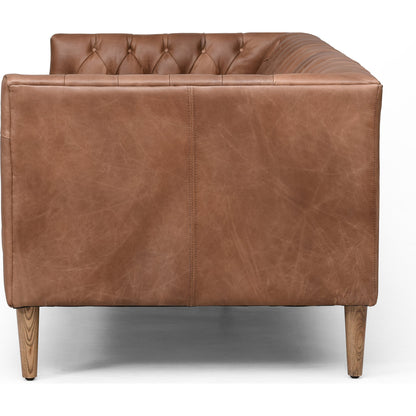 Williams Leather Sofa by Four Hands. Made from top grain leather, solid ash, 100% polyester in a rustic style.