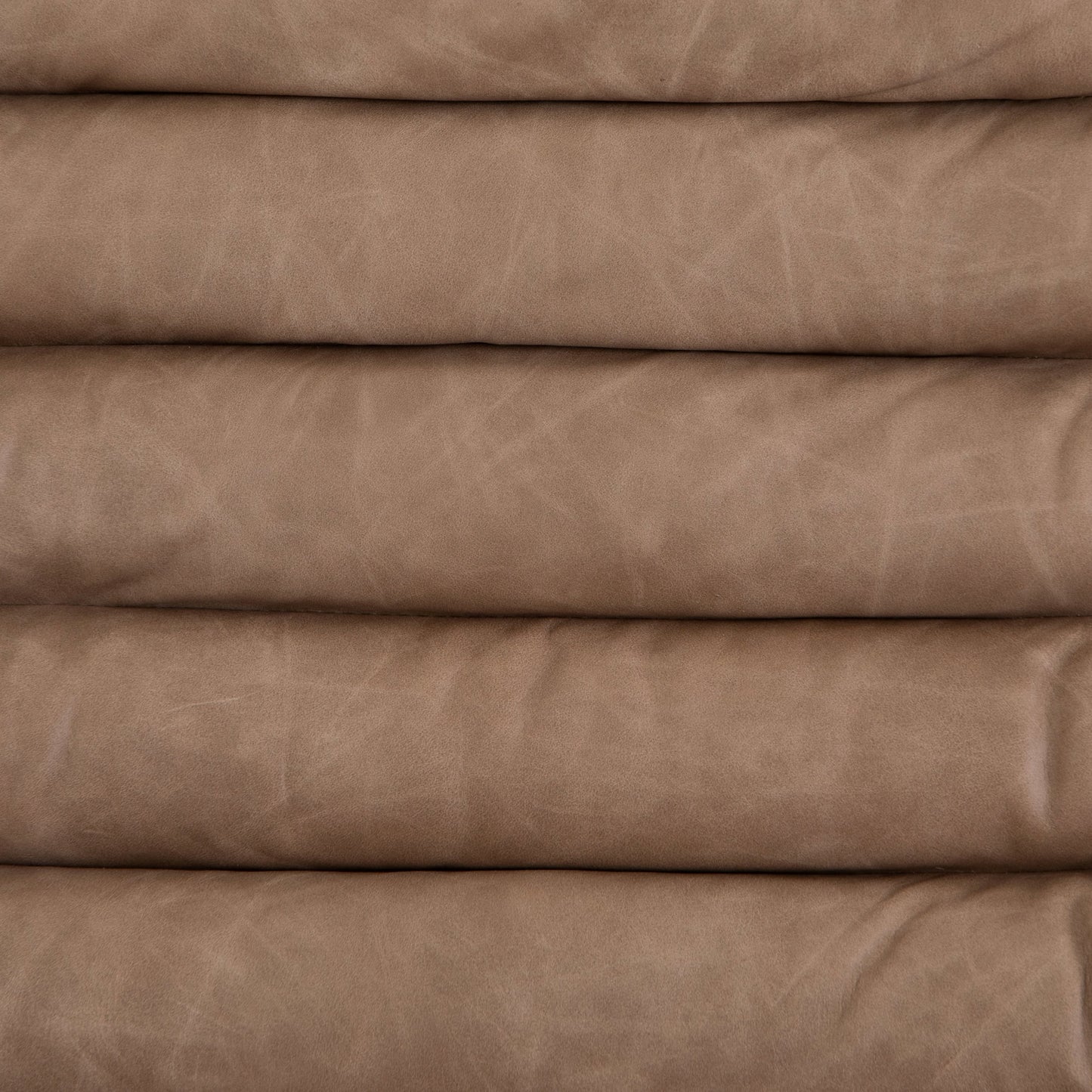045 SI-1901022 | Closeup | Malibu Desk Chair by Four Hands. Made from top grain leather, aluminum, 100% polyester in a modern style.