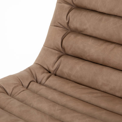 Malibu Desk Chair by Four Hands in rider black. Made from top grain leather, aluminum, 100% polyester in a modern style.