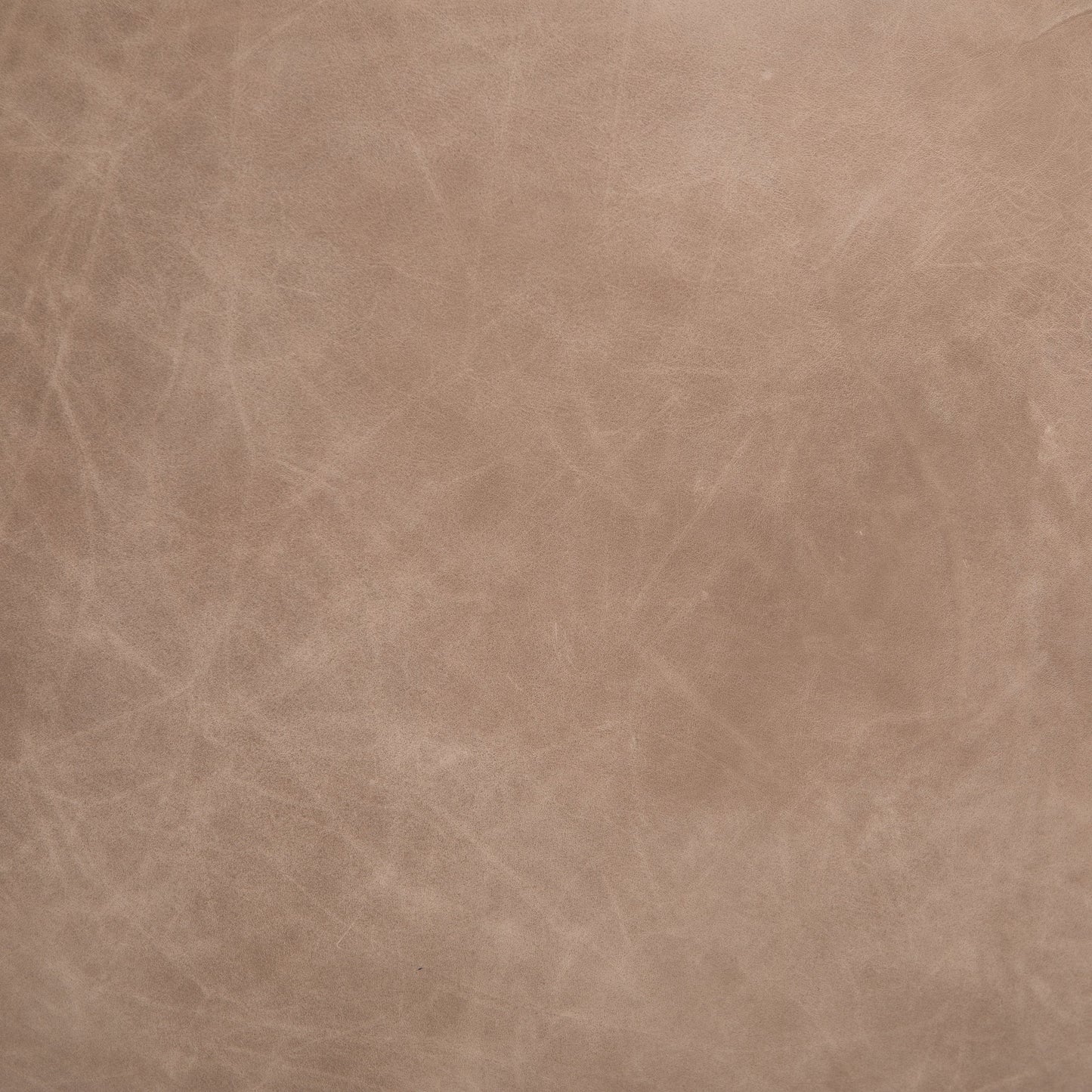 055 SI-1901022 | Closeup | Malibu Desk Chair by Four Hands. Made from top grain leather, aluminum, 100% polyester in a modern style.