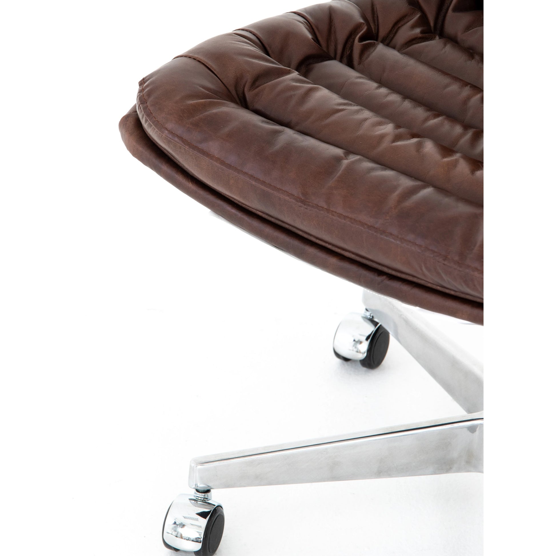 Malibu Desk Chair by Four Hands in rider black. Made from top grain leather, aluminum, 100% polyester in a modern style.