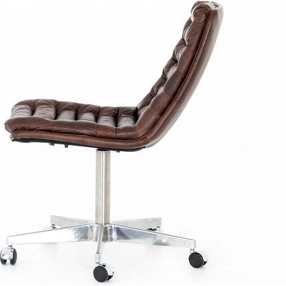 Malibu Desk Chair by Four Hands in rider black. Made from top grain leather, aluminum, 100% polyester in a modern style.
