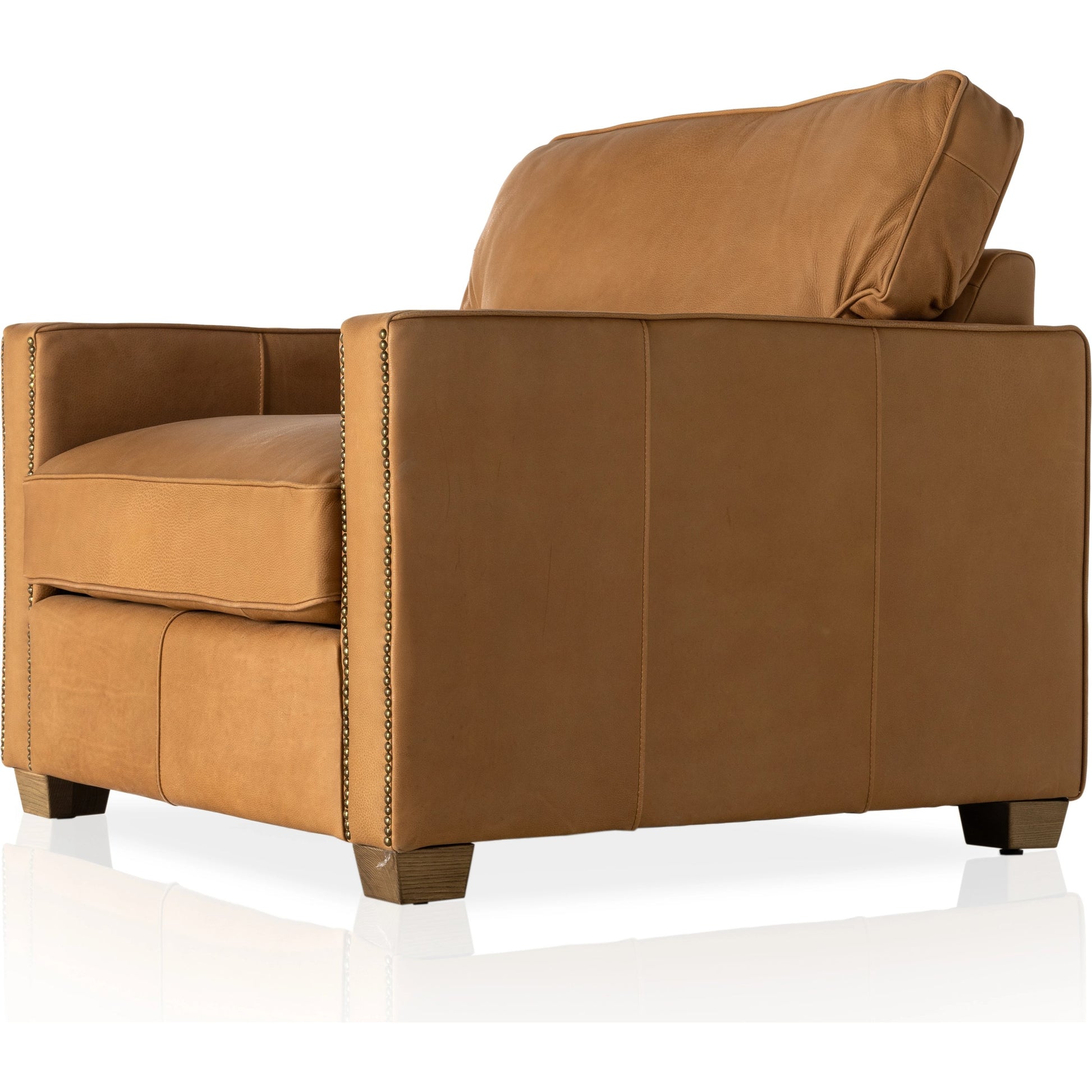 Larkin Club Chair by Four Hands in cigar and antique oak, antique brass nailhead. Made from top grain leather, solid ash, iron in a modern style.