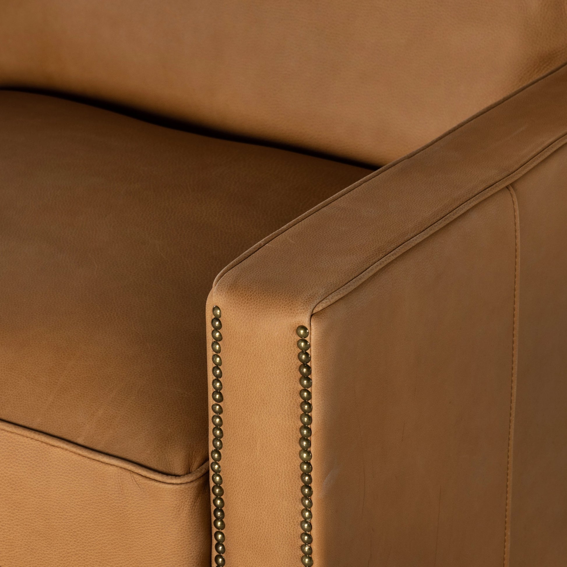 Larkin Club Chair by Four Hands in cigar and antique oak, antique brass nailhead. Made from top grain leather, solid ash, iron in a modern style.