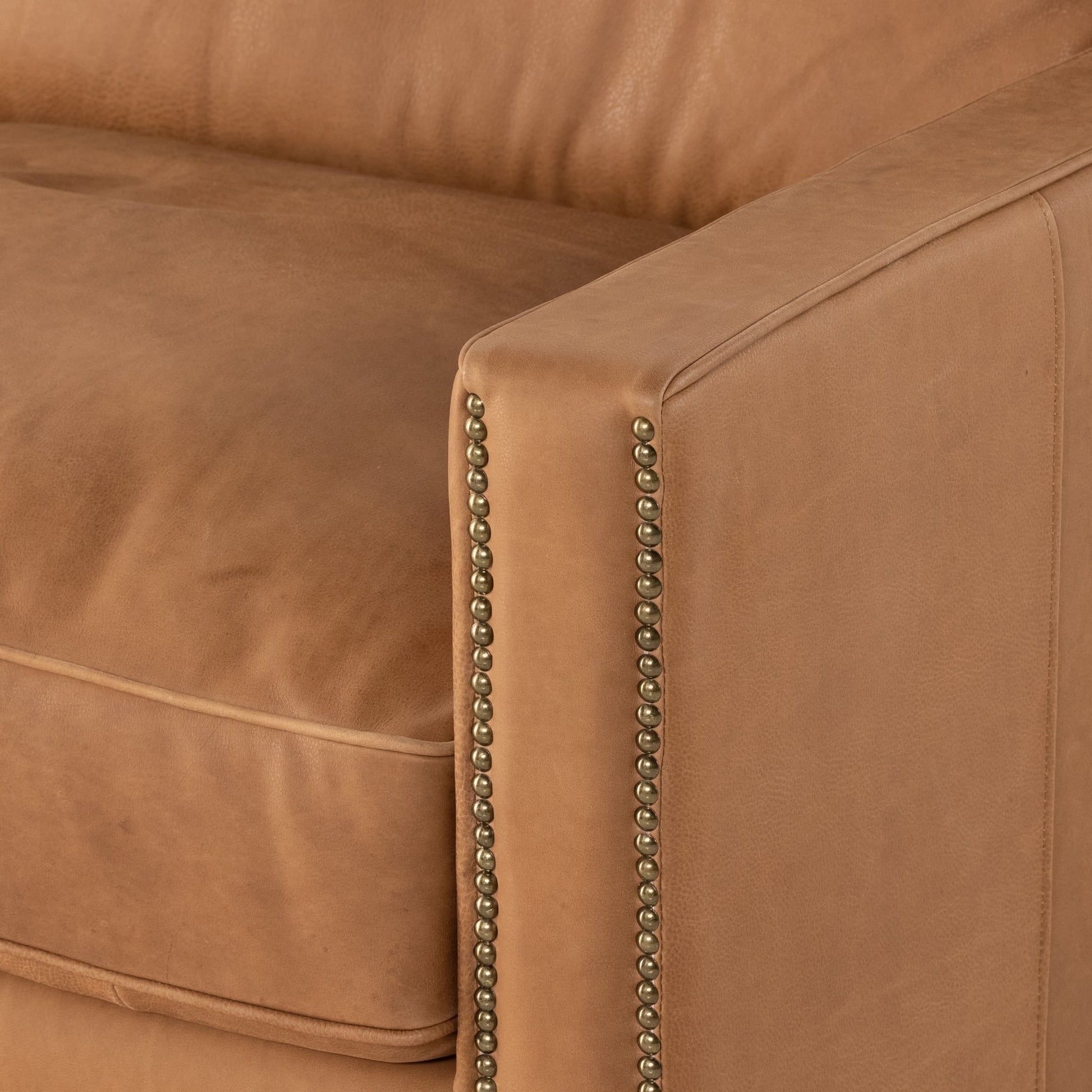 Larkin Sofa by Four Hands in cigar, antique oak, antique brass nailhead. Made from top grain leather, solid ash, iron in a modern style.