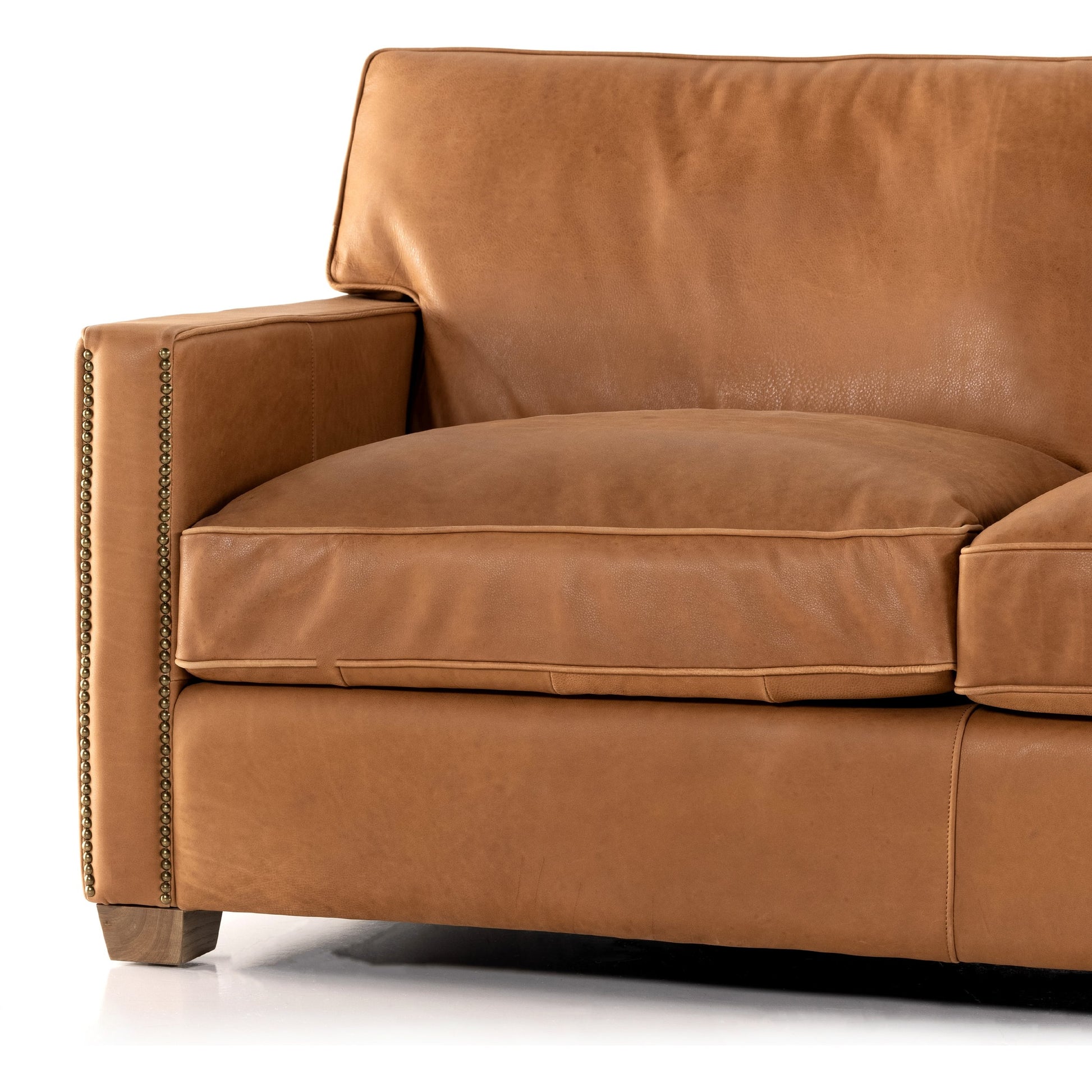 Larkin Sofa by Four Hands in cigar, antique oak, antique brass nailhead. Made from top grain leather, solid ash, iron in a modern style.