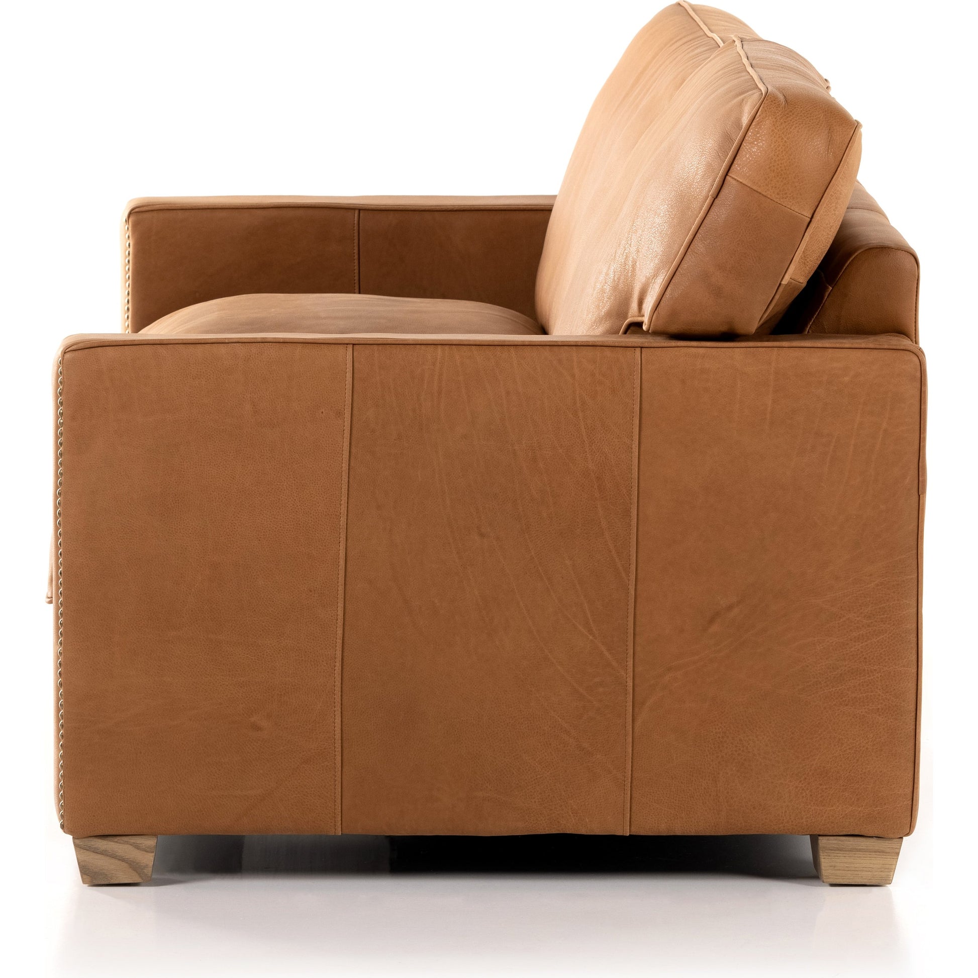 Larkin Sofa by Four Hands in cigar, antique oak, antique brass nailhead. Made from top grain leather, solid ash, iron in a modern style.