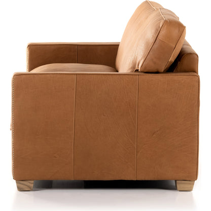 Larkin Sofa by Four Hands in cigar, antique oak, antique brass nailhead. Made from top grain leather, solid ash, iron in a modern style.