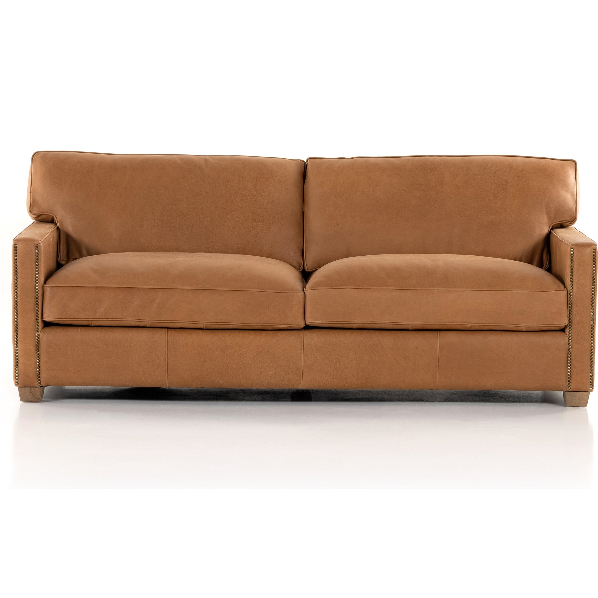 Larkin Sofa by Four Hands in cigar, antique oak, antique brass nailhead. Made from top grain leather, solid ash, iron in a modern style.