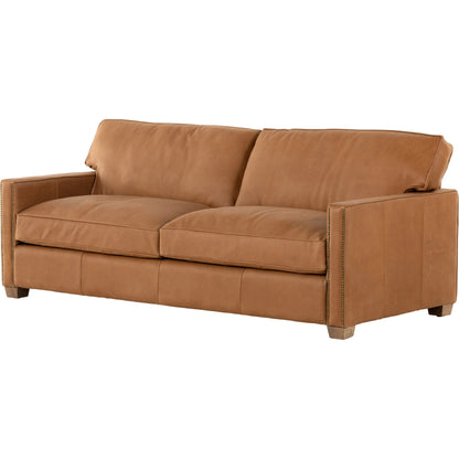 Larkin Sofa by Four Hands in cigar, antique oak, antique brass nailhead. Made from top grain leather, solid ash, iron in a modern style.