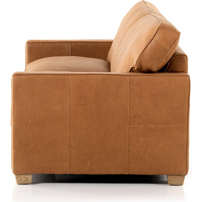 Larkin Sofa by Four Hands in cigar, antique oak, antique brass nailhead. Made from top grain leather, solid ash, iron in a modern style.