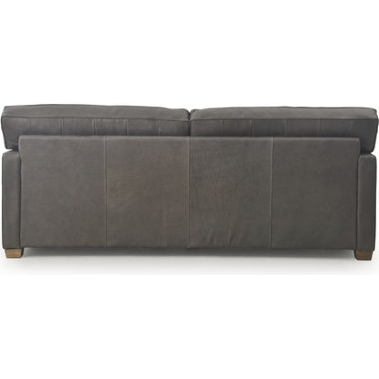 Larkin Sofa by Four Hands in cigar, antique oak, antique brass nailhead. Made from top grain leather, solid ash, iron in a modern style.