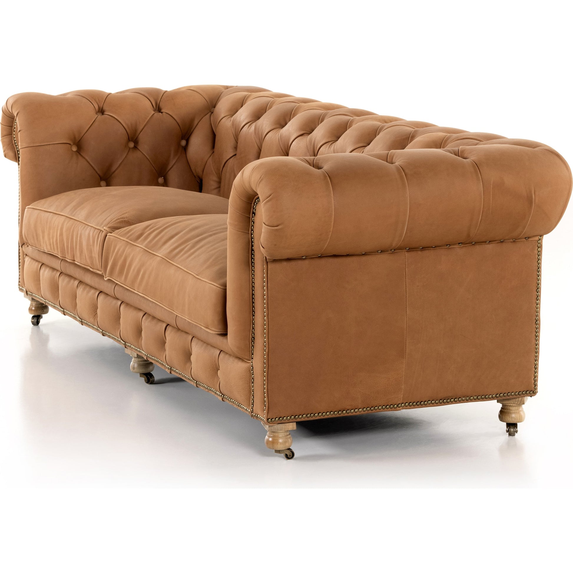 Conrad Sofa by Four Hands in cigar, antique oak, antique brass nailhead. Made from top grain leather, solid ash, iron in a traditional style.