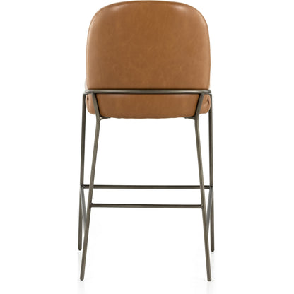 Astrud Bar Stool by Four Hands in sierra butterscotch. Made from faux leather, iron, top grain leather in a modern style.