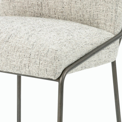 Astrud Bar Stool by Four Hands in sierra butterscotch. Made from faux leather, iron, top grain leather in a modern style.