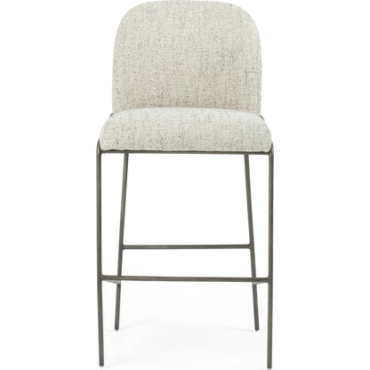 Astrud Bar Stool by Four Hands in sierra butterscotch. Made from faux leather, iron, top grain leather in a modern style.