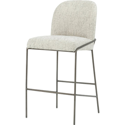 Astrud Bar Stool by Four Hands in sierra butterscotch. Made from faux leather, iron, top grain leather in a modern style.