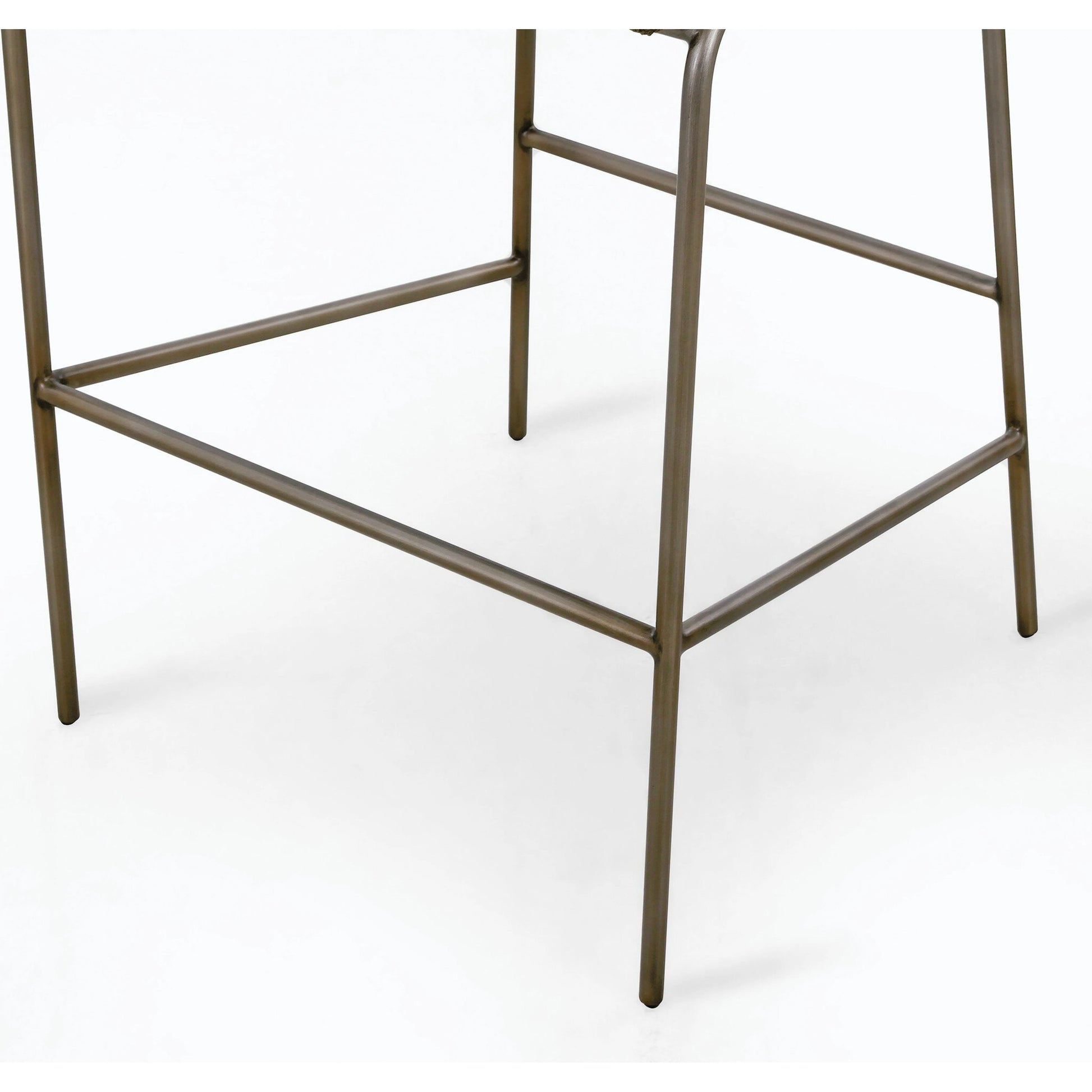 Astrud Bar Stool by Four Hands in sierra butterscotch. Made from faux leather, iron, top grain leather in a modern style.