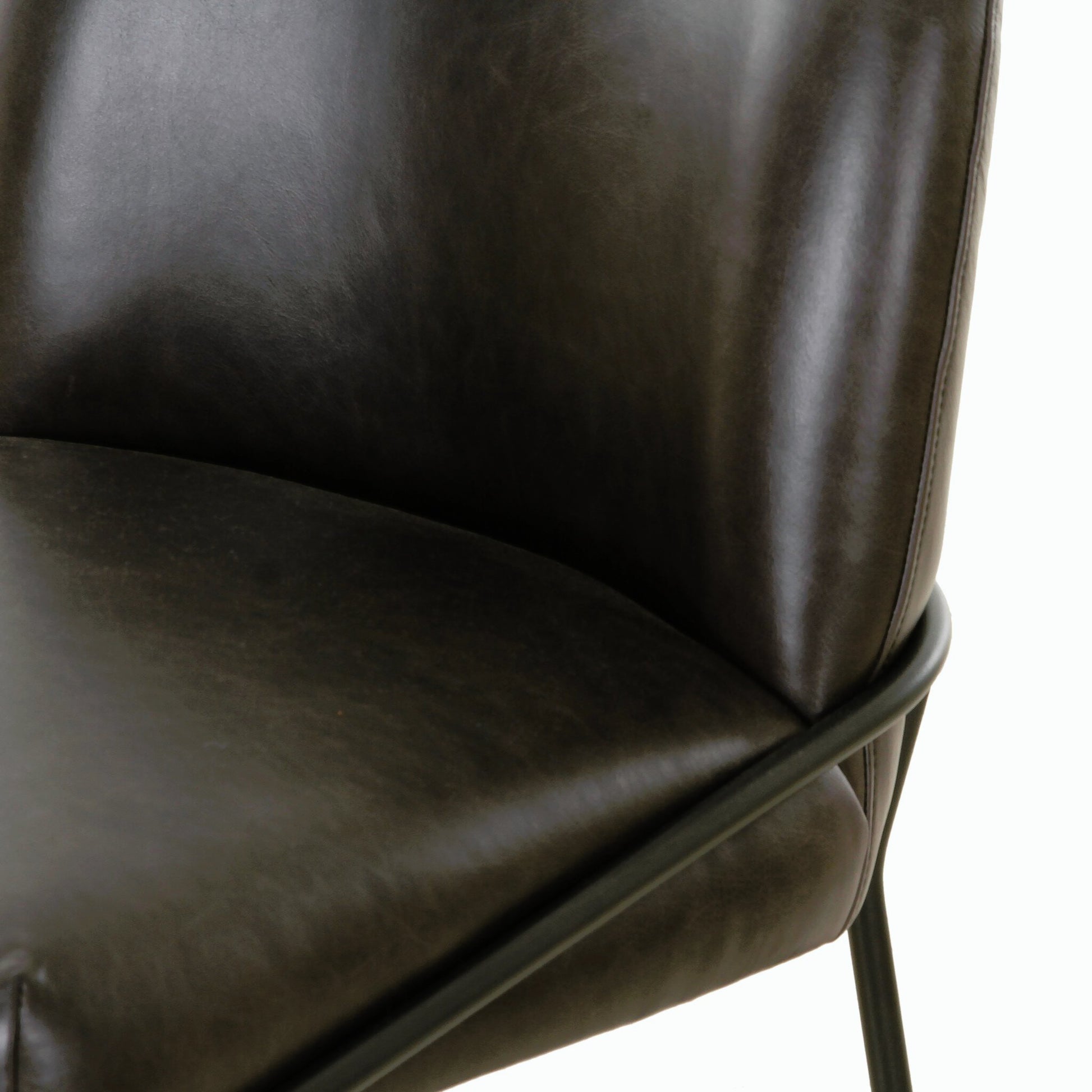 Astrud Bar Stool by Four Hands in sierra butterscotch. Made from faux leather, iron, top grain leather in a modern style.