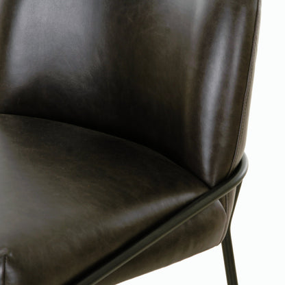 Astrud Bar Stool by Four Hands in sierra butterscotch. Made from faux leather, iron, top grain leather in a modern style.