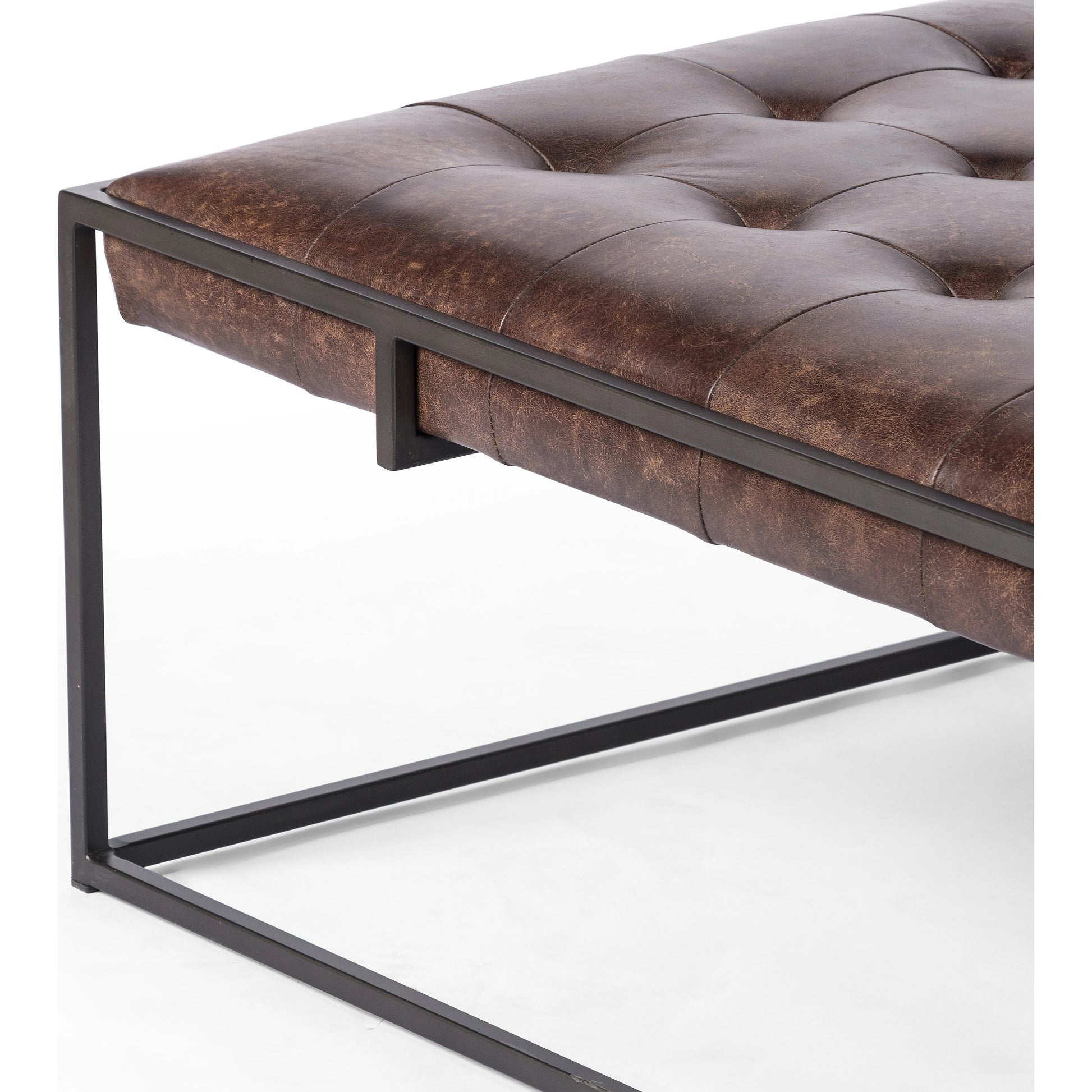 Oxford Coffee Table by Four Hands in rialto ebony and antique brass. Made from top grain leather, iron, 100% polyester in a modern style.