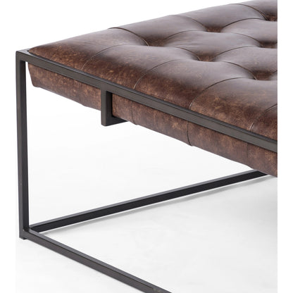 Oxford Coffee Table by Four Hands in rialto ebony and antique brass. Made from top grain leather, iron, 100% polyester in a modern style.