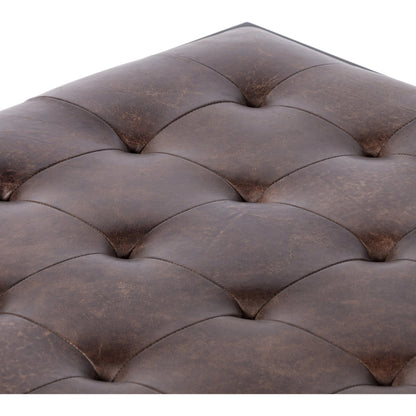 Oxford Coffee Table by Four Hands in rialto ebony and antique brass. Made from top grain leather, iron, 100% polyester in a modern style.