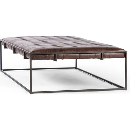 Oxford Coffee Table by Four Hands in rialto ebony and antique brass. Made from top grain leather, iron, 100% polyester in a modern style.