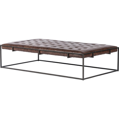 Oxford Coffee Table by Four Hands in rialto ebony and antique brass. Made from top grain leather, iron, 100% polyester in a modern style.